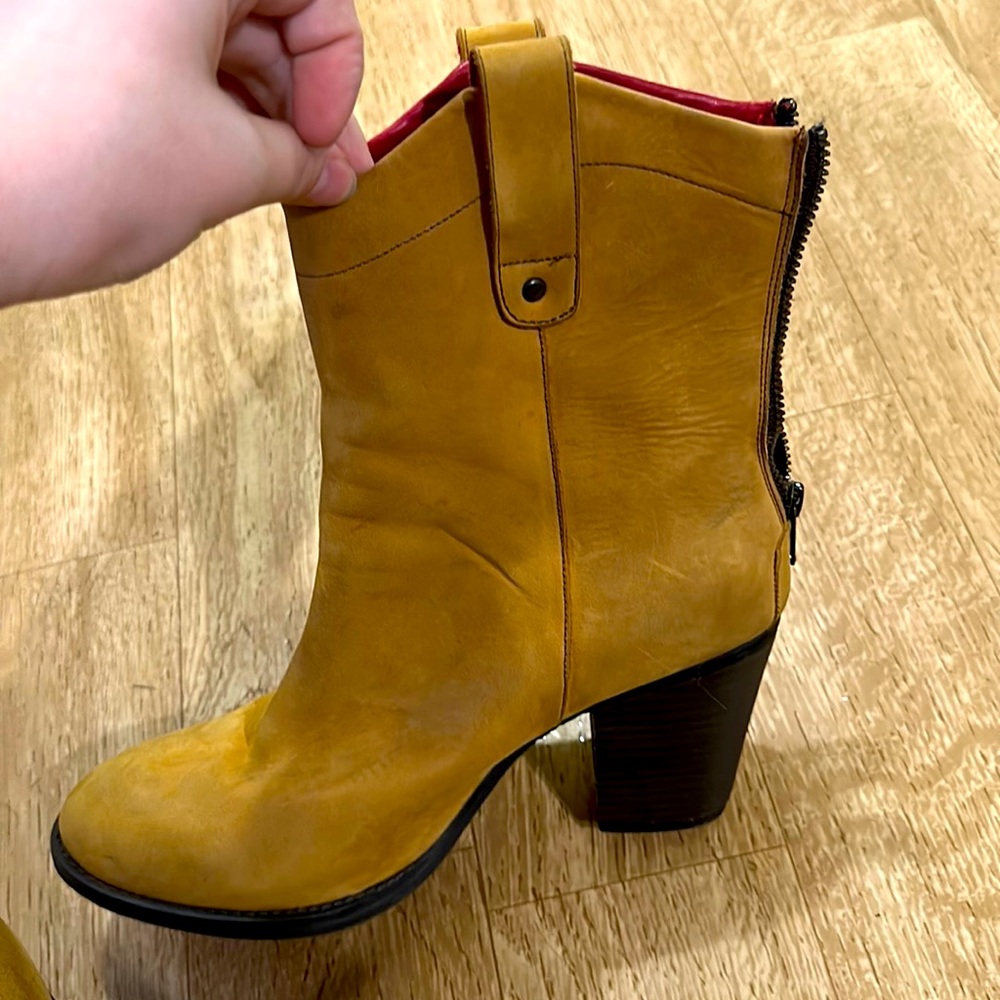 Tan boots, really cute with dresses.There in great condition, leather boots.